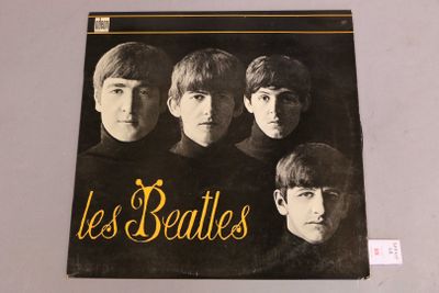 a black and white photo of the beatles album