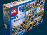 a box of lego construction toys on a blue background