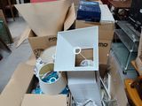 a pile of boxes that are sitting on the floor