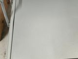 a metal tray that is sitting on top of a table