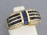 une image représentant une bague en or sertie de saphirs et de diamants