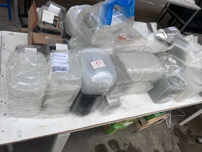 a table with a lot of computer equipment on it
