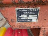 a close up of a red and yellow container with a label on it