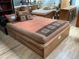 a bed that is sitting in the middle of a room