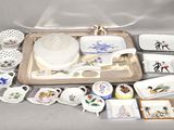 a tray with a tray of dishes and cups on it