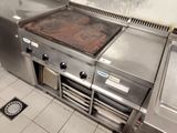 an image of a commercial kitchen with stainless steel appliances