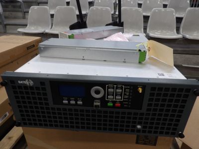 une image représentant une machine posée sur une boîte