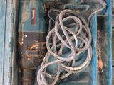 a blue tool box with a bunch of tools inside of it