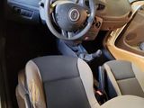 a picture of a car with a steering wheel and a dashboard