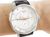 a close up of a person ' s wrist with a watch on it