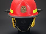 a close up of a fireman ' s helmet on a mannequin head