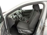 the interior of a car with the door open showing the driver ' s seat