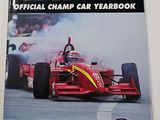 an image of a book with a picture of a racing car on it