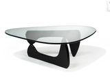an image of a glass coffee table with black legs and a glass top