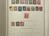 an open book with a bunch of stamps on it