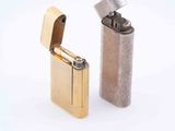 two lighters sitting next to each other on a white surface