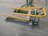 a cart that is sitting on the concrete floor