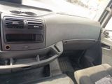a dashboard of a car with a radio in it