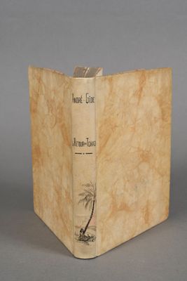 an old book with a picture of a palm tree on it