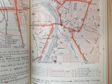 an open book with a map of a city on it