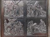 an image of a metal door with a bunch of pictures on it