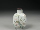 an image of a white vase with flowers on it on a table