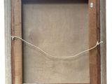 an old picture frame with a rope hanging from it ' s side