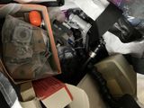 a box full of assorted items sitting on the floor