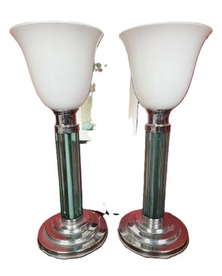 two lamps that are sitting on top of each other