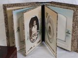 an open book with a picture of a man and a woman on it