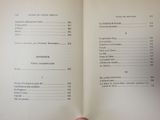 a person holding a book with a list of items in it
