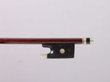 a close up of a violin bow on a white background
