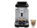 une machine à café avec deux tasses de café à côté