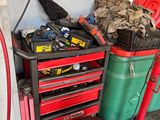 a red and black tool cart with tools in it