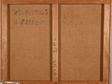 an old picture of a wooden frame with writing on it