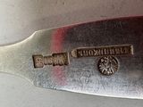 a knife that is sitting on a table