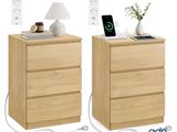 two nightstands with a charging station and a phone on them