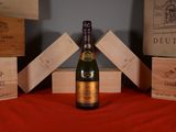 a bottle of wine that is sitting on a table