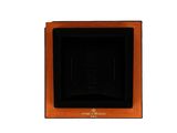 the watch winder is made of wood and has a glass door