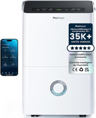 une photo d'un purificateur d'air blanc à côté d'un téléphone portable