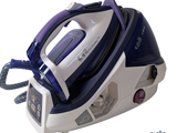 a blue and white steam iron sitting on a white surface