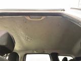 a view of the inside of a car from the driver ' s seat