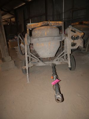 a cement mixer sitting in the middle of a building