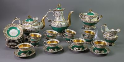 many different types of tea and coffee sets on the table