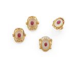 a set of three gold and ruby stone ear clips