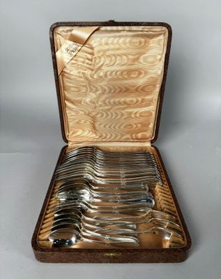a case with a set of silverware in it