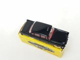 a toy car that is sitting on top of a box