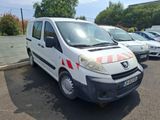 a picture of a white van parked in a parking lot