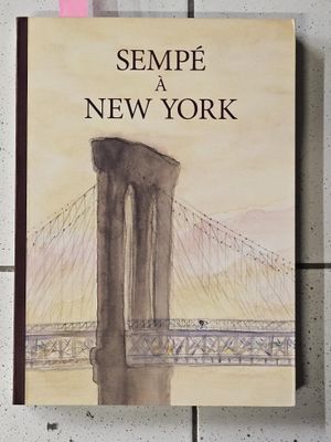a book with a picture of a bridge on it