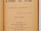an old book opened to show the title of the novel dans la rue